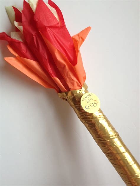Olympic Party 101DIY Olympic Torch! | Olympic theme party, Olympic party decorations, Olympic 