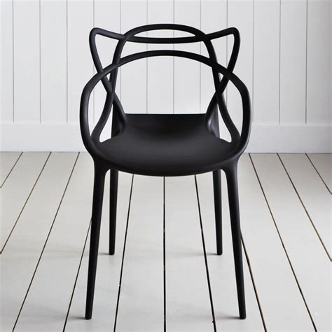 It takes on a new technological challenge with highly sophisticated. Masters chair by Philippe Starck / black | Mad for Modern