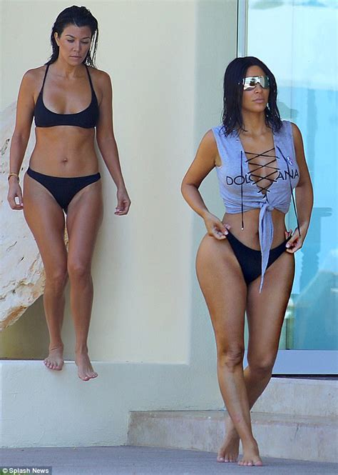 No Bikini Top No Problem Kim Kardashian Flaunts Her Hourglass Figure In High Cut Swimwear