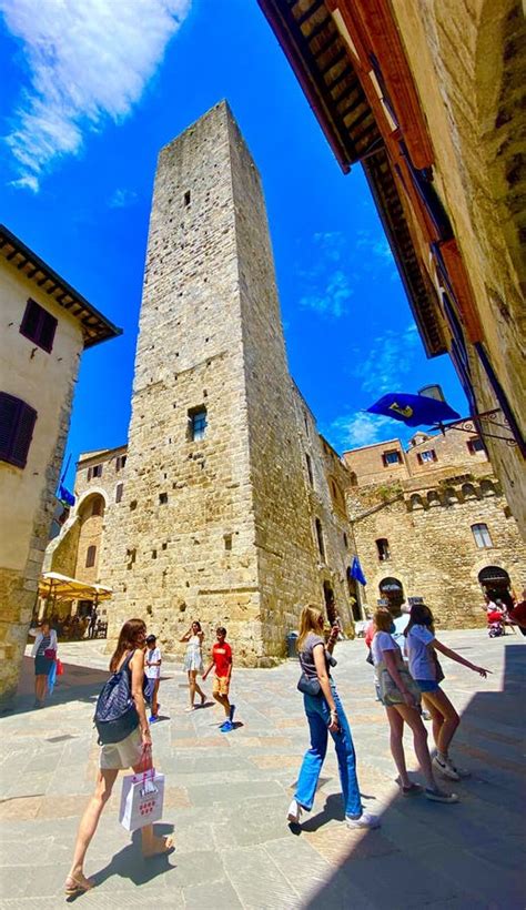 tall stone towers in the medieval town of san gimignano in italy editorial photo image of