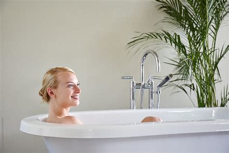 Beautiful Woman Smiling In Bathtub At Luxury Spa By Stocksy Contributor Trinette Reed Stocksy