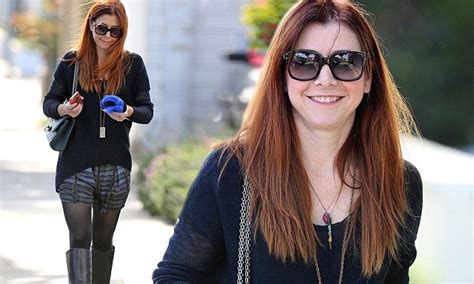 Alyson Hannigan Spices Up Her Style In Racy Shorts And Knee High