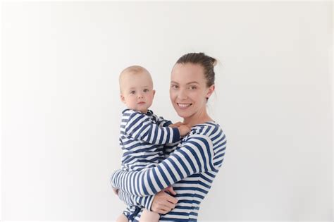 Premium Photo Woman Holding Baby Upside Down