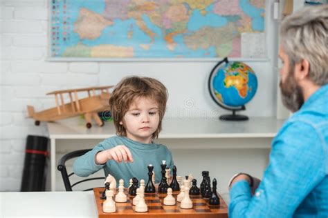 Child Chess School Preschooler Or Schoolboy Boy Kid Playing Chess At