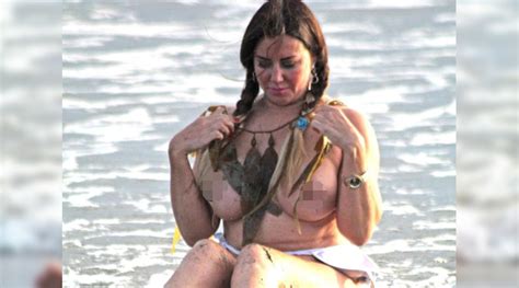 Lisa Appleton Risks Jail By Going Topless On The Beach