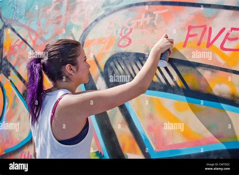 Female Graffiti Artist At Work In Torontoontariocanada Stock Photo