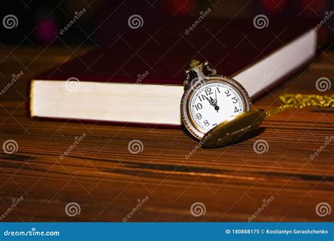 A Pocket Watch With Book Background Stock Image Image Of History