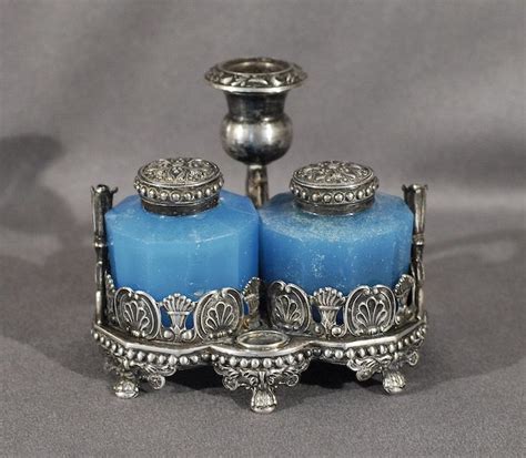 Their business is recorded as domestic business corporation. A double blue glass inkstand. British Sterling Silver ...