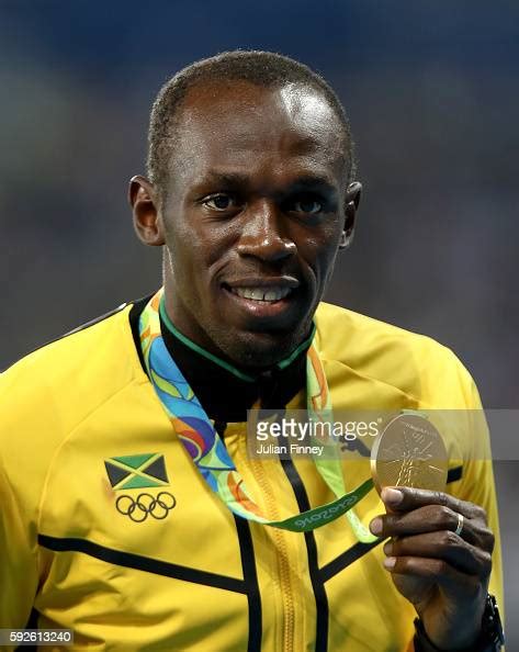 gold medalist usain bolt of jamaica stands on the podium during the news photo getty images