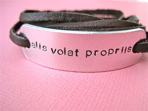 Alis Volat Propriis Bracelet Latin With Wings She Flies