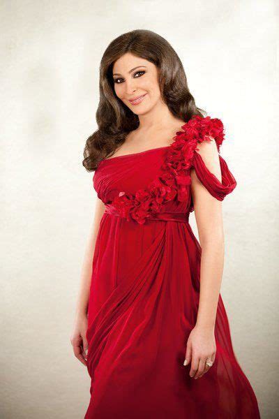 بالصور نجمات إخترن الفستان الأحمر لإطلالاتهن أنوثة