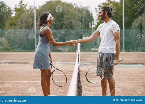 Two Tennis Players Shaking Hands After The Match Stock Photo Image Of Family Male