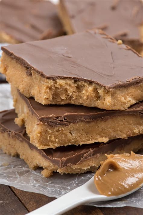 Spread chocolate with a spatula. The BEST Peanut Butter Bars - Crazy for Crust