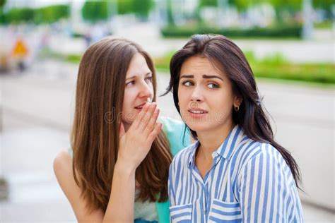 Two Young Women Talking To Each Other Stock Image Image Of Attractive