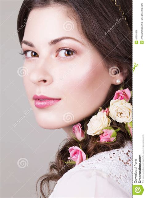 Beautiful Brunette Bride Smiling With Natural Make Up And Flowers Roses