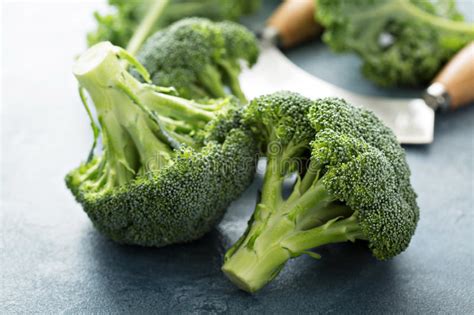 Fresh Green Broccoli Heads On The Table Stock Photo Image Of Fresh