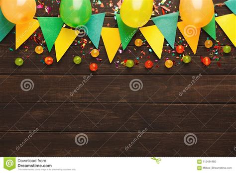 colorful flags garland  wooden background stock photo image  celebration carnival