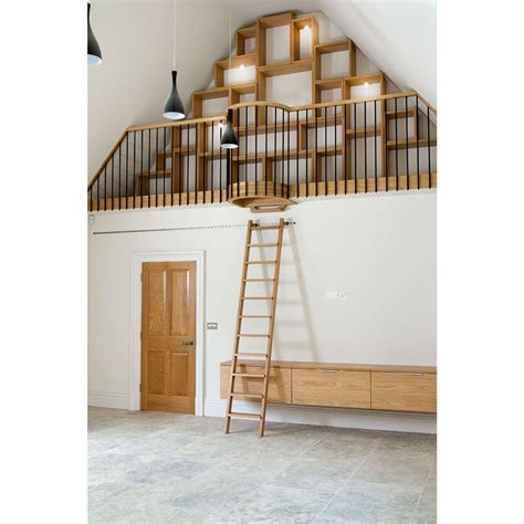 Rolling Ladder In Vaulted Area Of Kitchen From Peter Loft Ladder