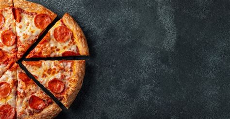 Premium Photo Tasty Pepperoni Pizza On A Black Concrete Background