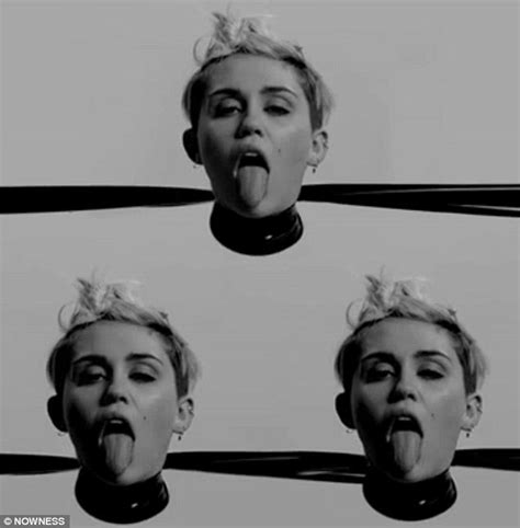 Miley Cyrus Wears Nothing But Nipple Tape And Latex Panties In Tongue