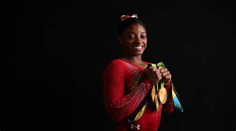 Olympic team, she was shouldering her country's gold medal. Simone Biles wins fourth gold medal at Rio Olympics - Sports Illustrated