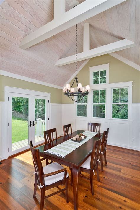 This Dining Room Features A Vaulted Whitewashed Tongue And Groove