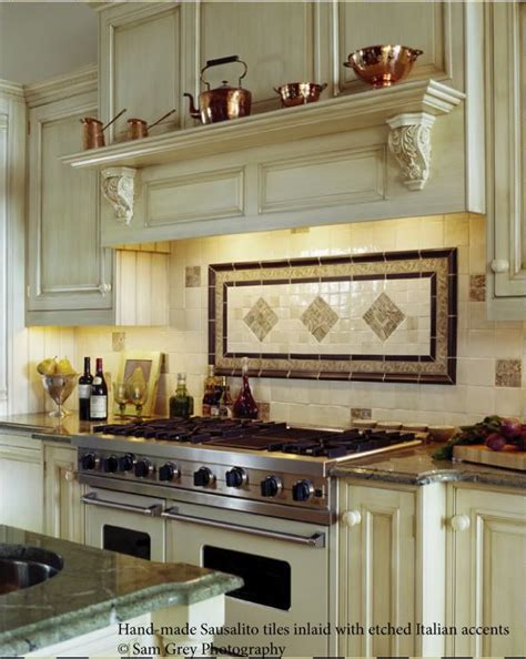 Depending on the tile that is to be installed, and where it will be installed a stainless steel splashback can make a stylish addition to your kitchen that also protects the wall behind your cooktop. backsplash ideas for behind the range | ... -bronze-tile-backsplash-over-stove-traditional ...