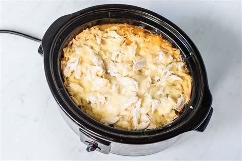 I recall often eating these chicken enchiladas with very little cheese on them. Crock Pot Chicken Enchilada Casserole Recipe