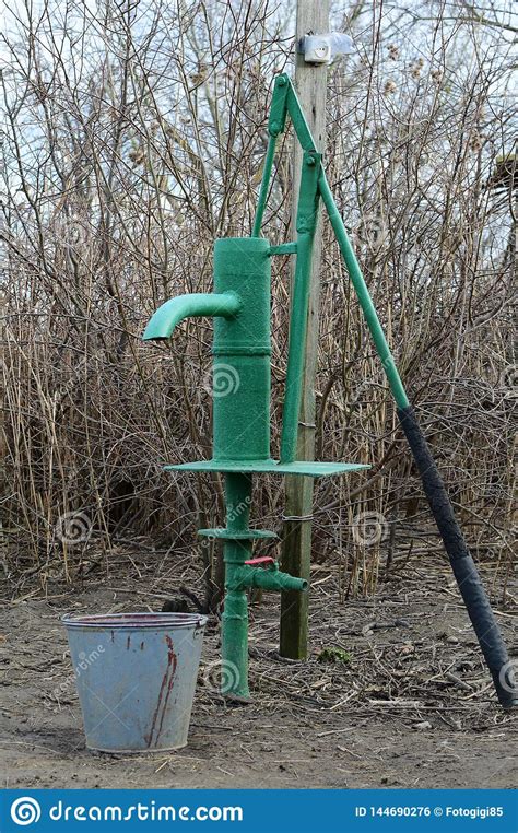 Hand Pump Leading To An Artesian Well Stock Photo Image Of Green