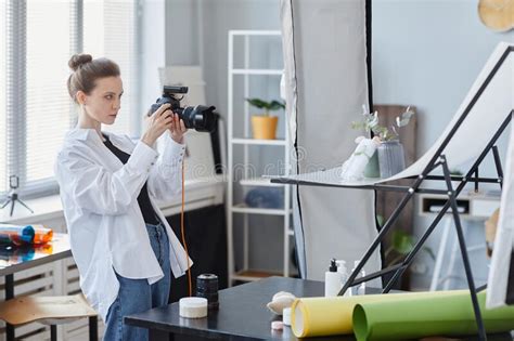 Side View Of Female Photographer Working In Studio Stock Image Image