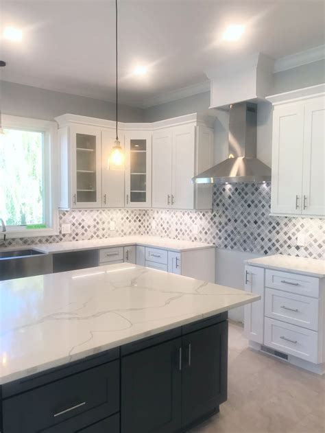 The former kitchen included a pantry with white doors. Modern farmhouse two tone kitchen | Modern grey kitchen ...