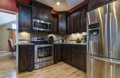 When it comes to managing and planning dark cabinets in the kitchen, you don't actually go with the pitch black color. Small Kitchens with Dark Cabinets (Design Ideas ...