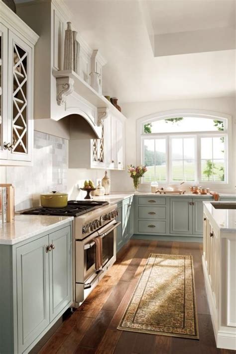A cool, measured balance of classical elegance informs these painted kitchen cabinets. Farmhouse Kitchen Cabinets Paint Colors - The kitchen ...