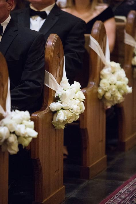 Ceremony Décor Photos White Roses On Church Pews Inside Weddings