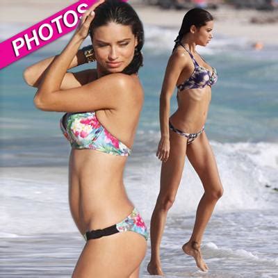 Adriana Lima Strips Down To Tiny Bikini For Beach Shoot