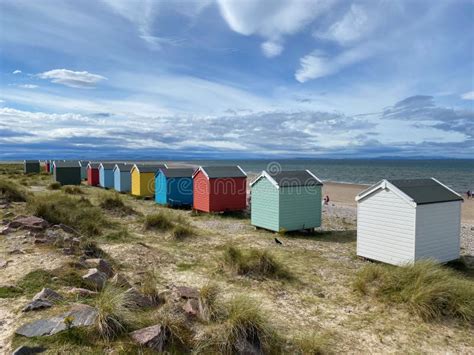 Colorful Wooden Beach Huts At Findhorn Beach Editorial Stock Image