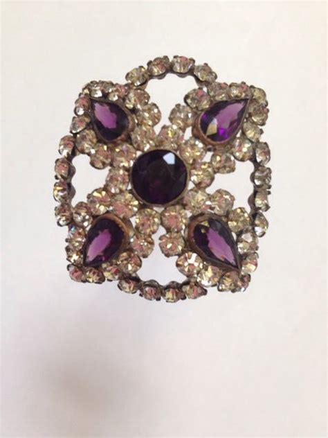 Antique Hatpin With Large Amethyst Colored Stones Surrounded With Clear