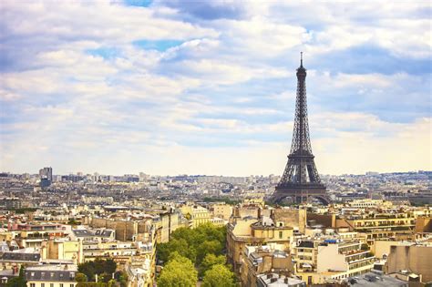 Lifts ascend to the tower's three floors; 13 Best Hotels In Paris With Gorgeous Eiffel Tower Views ...