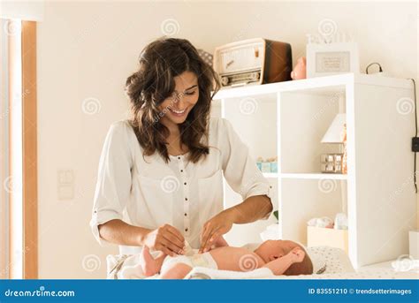 Mother Changing Baby S Diaper Stock Photo Image Of Lying Changing