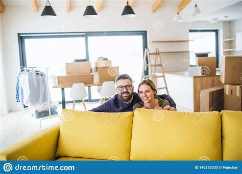 A Portrait Of Young Couple Moving In New Home Stock Image Image Of