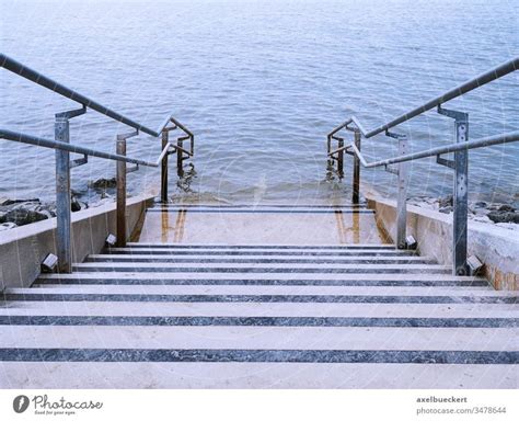 Railing And Wall On A River A Royalty Free Stock Photo From Photocase