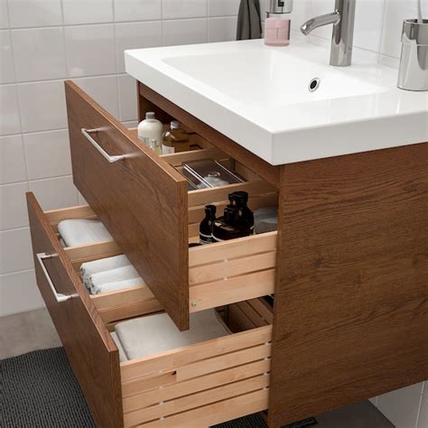 Changing up the look of any bathroom is as easy as adding a chic and modern bathroom vanity. GODMORGON / ODENSVIK Bathroom vanity - brown stained ash ...