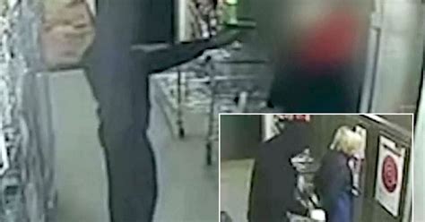 Caught On Cctv Masked Robbers Push Guns Against Shop Workers Heads
