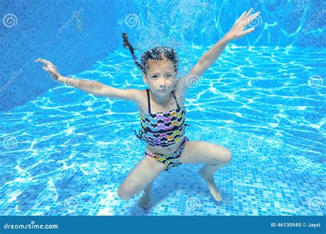 Happy Active Underwater Child Swims In Pool Stock Image Image Of