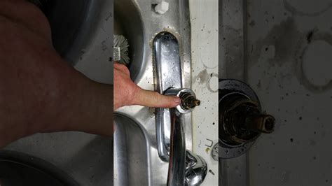 Instead, it has a slightly inset surface on top of the faucet, which is covered with a 'moen' sticker. How to remove a stuck Moen Kitchen Faucet cartridge the ...