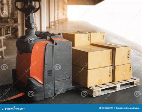 Electric Forklift Pallet Jack With Package Boxes On Pallet At The Warehouse Shipping Warehouse