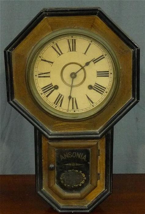 An American Ansonia Regulator Wall Clock In A Walnut Case 50 Cm