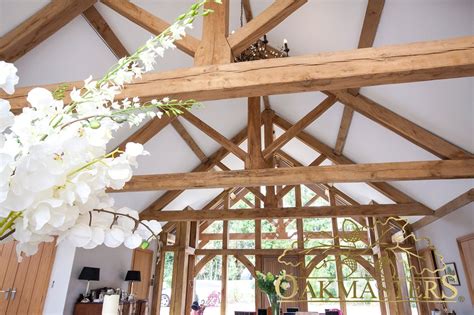 A scissor truss creates an interior vaulted ceiling for free. King post trusses and open vaulted ceilings - Oakmasters