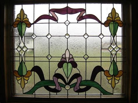 There is a window on the top facing the front side of the house, having 3 glasses as shown in the attached picture. 15 Beautiful Bathrooms with Stained Glass Windows - Rilane