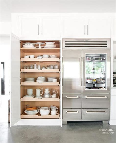 I am now able to just pull the pantry out and grab whatever i need and slide it back into hiding. Floor To Ceiling Pull Out Pantry Cabinet Design Ideas